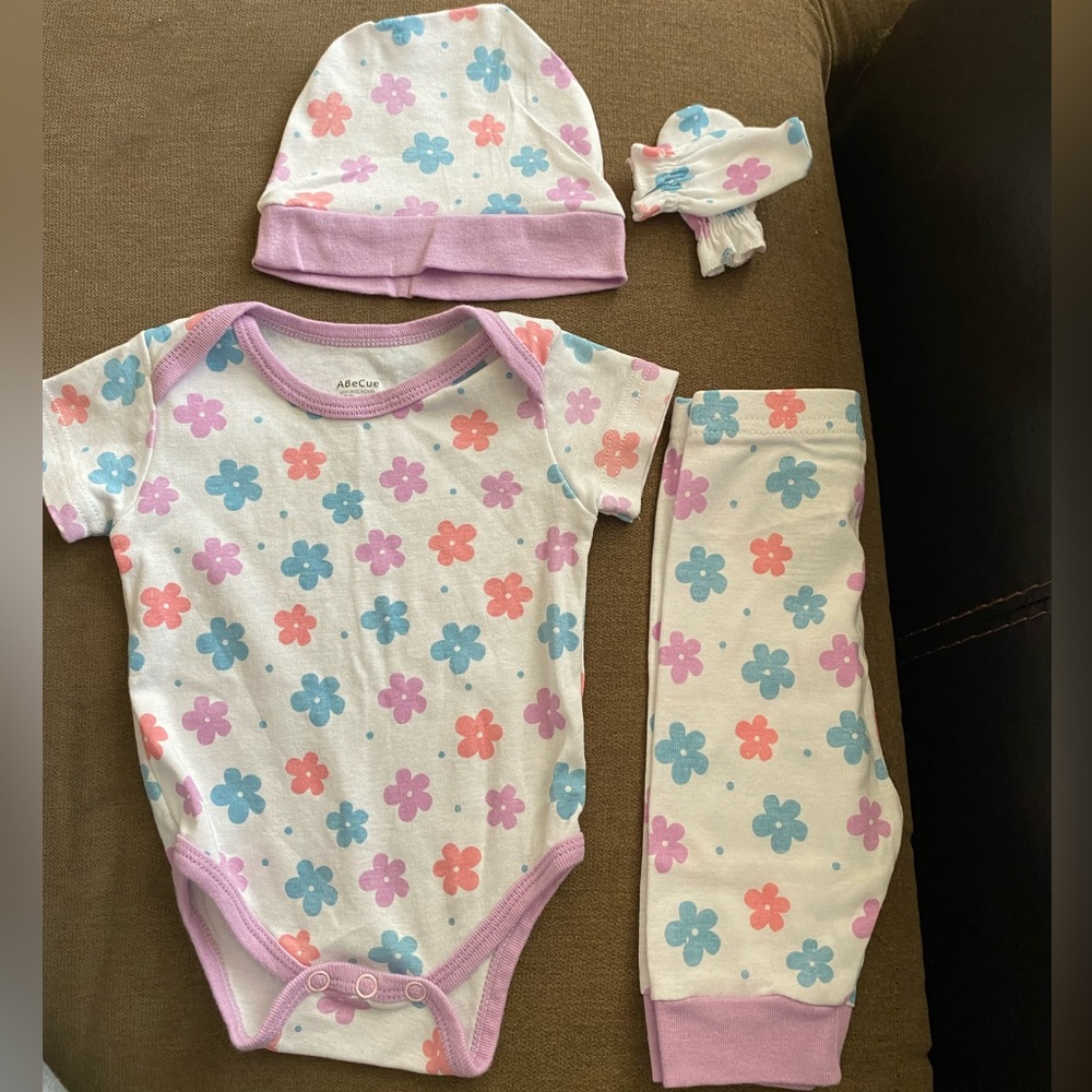 0 to 3 months girl onesie 4 piece set.
